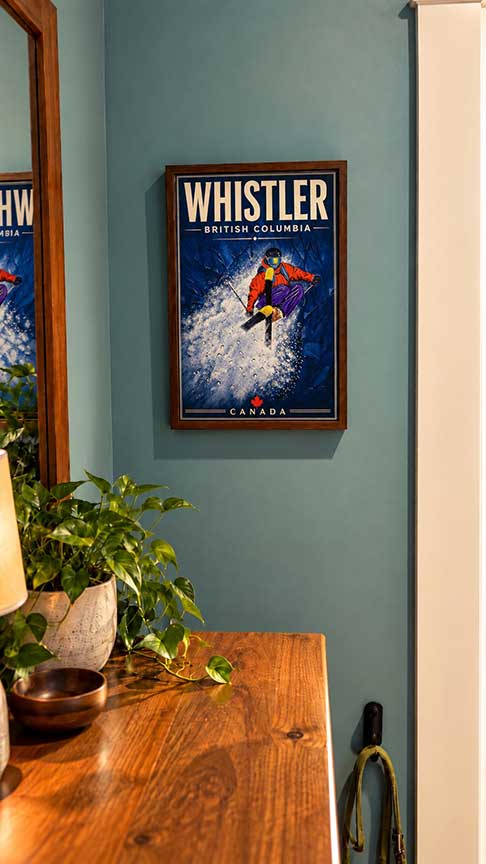 Whistler Canada wall art framed ski poster displayed in a home interior
